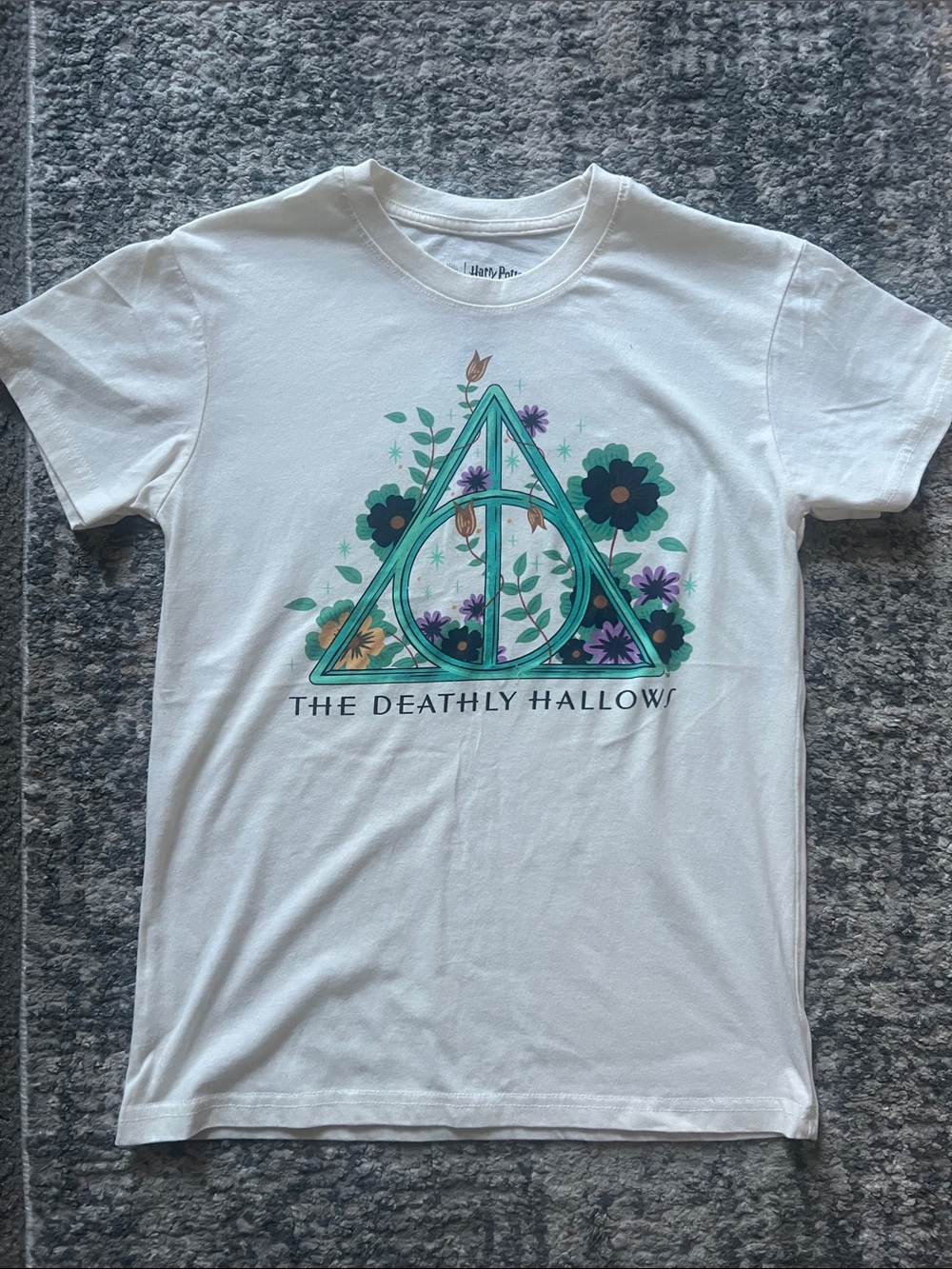 Warner Bros. White Kids Tee with Teal & Purple Floral Deathly Hallows Graphic